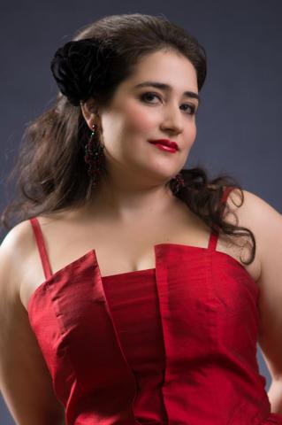 Photo of Mima Millo wearing a red dress